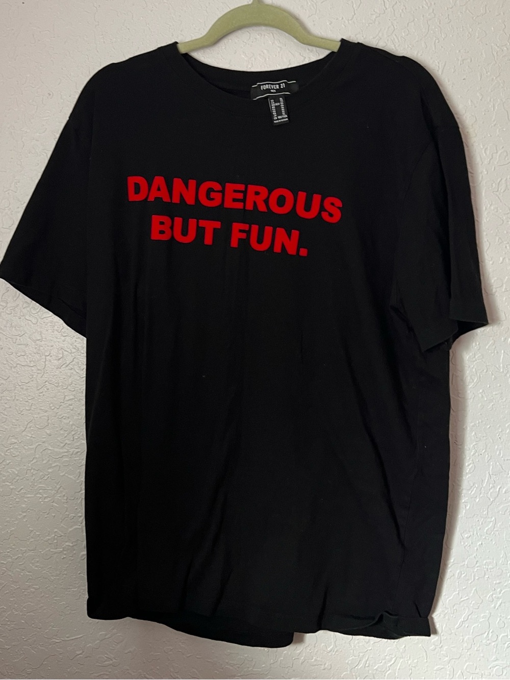 Forever 21 Black Tee with Red Slogan - "DANGEROUS BUT FUN."